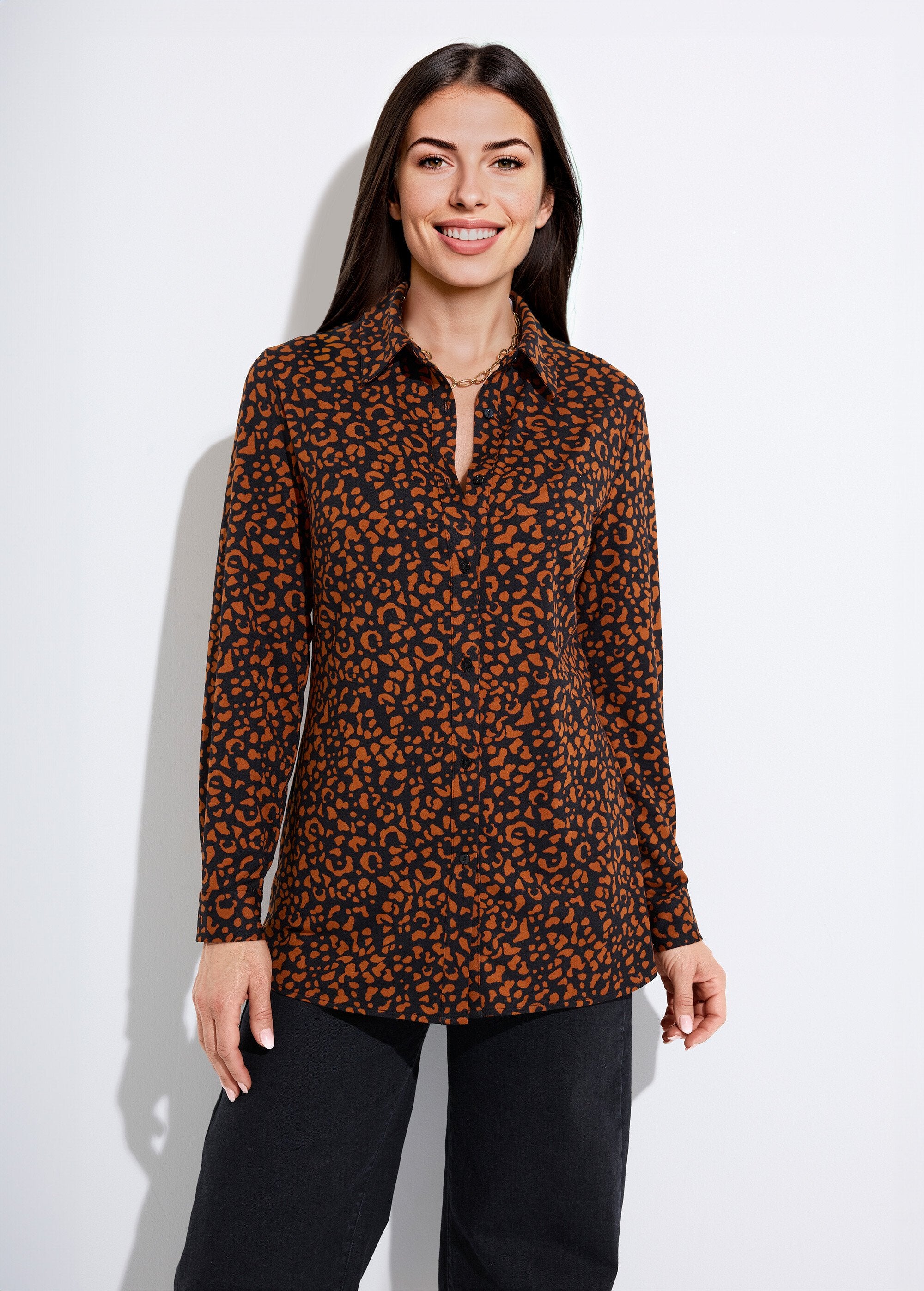 Warm_knit_blouse_with_animal_skin_print_Black_and_brown_FA1_slim
