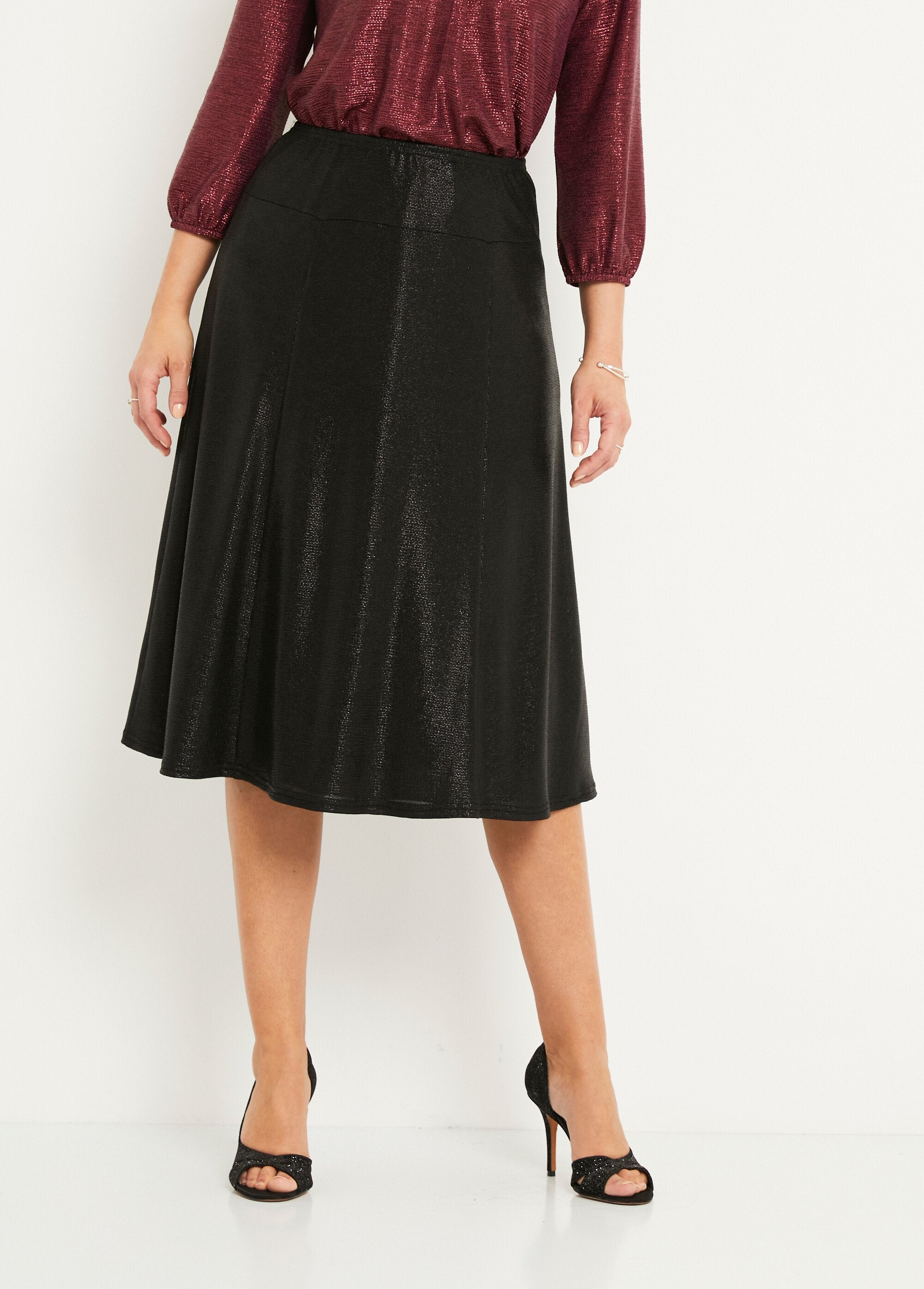 Mid-length_flared_skirt_in_shiny_knit_Black_FA1_slim