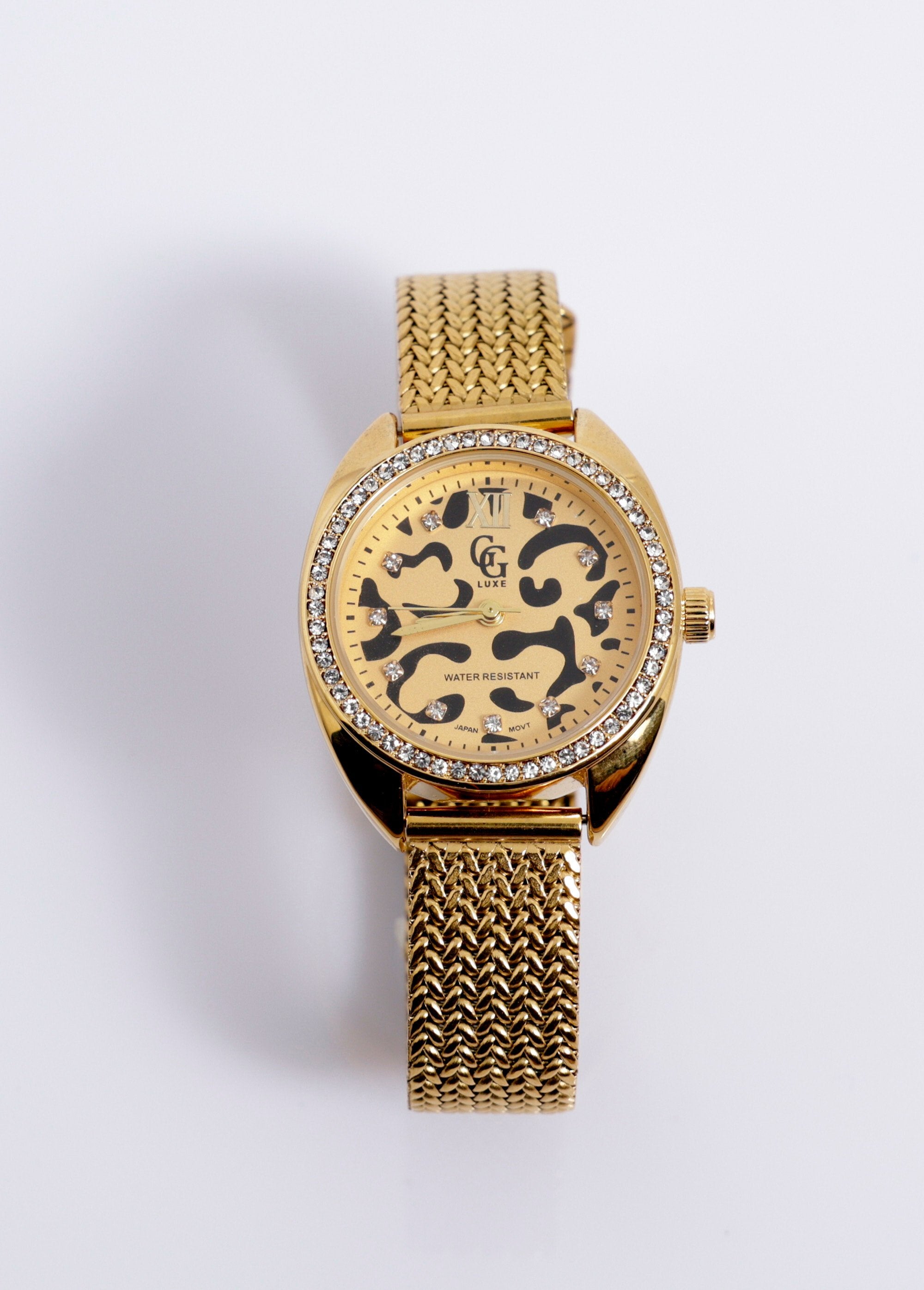 Steel_jewelry_watch_with_round_rhinestone_dial_Golden_leopard_FA1_slim