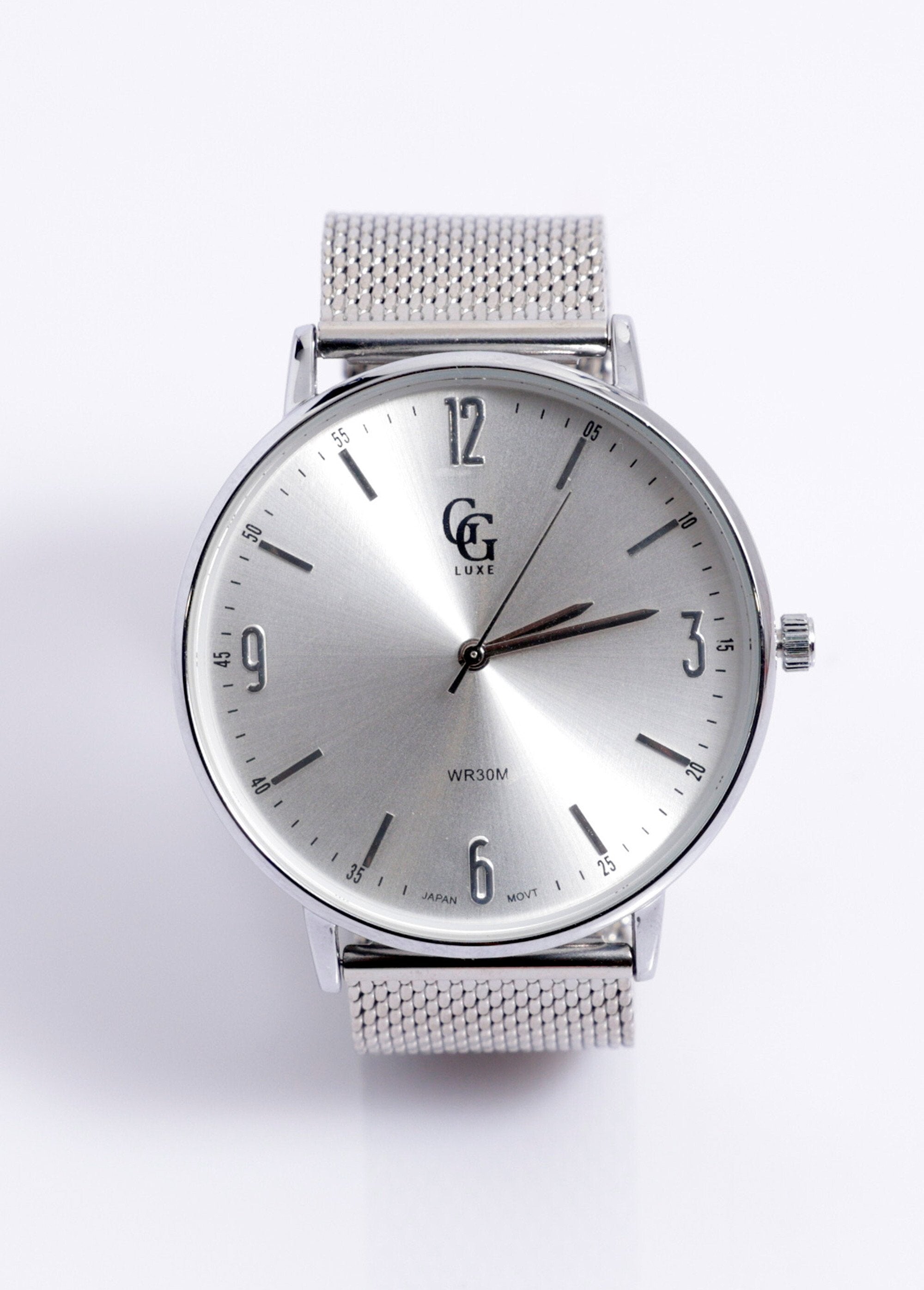 Round_watch_with_Milanese_mesh_bracelet,_1G_White_money_FA1_slim